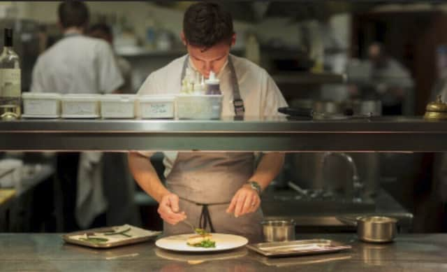 Head chef Adam Harper at work in the Rowley's kitchen