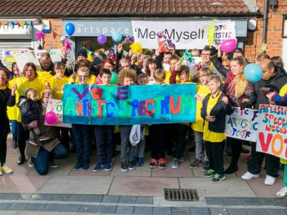 Emma Wilson (left) together with students, support staff and friends at The ArtSpace in Finkle Court Thorne where Artistic Spectrum has a workshop and gallery.