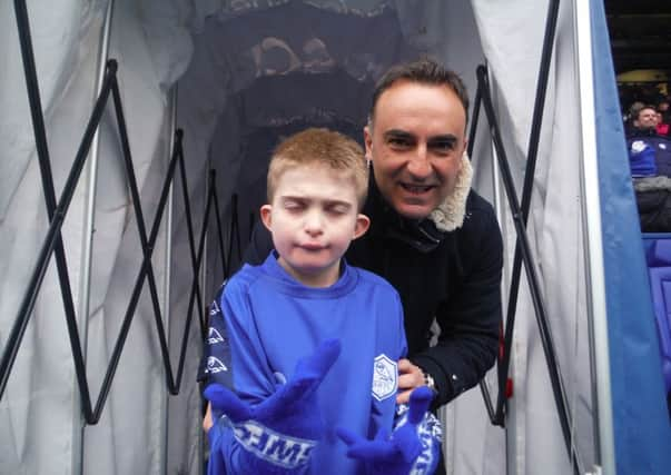 Joe Danforth, aged 10, with Owls boss Carlos Carvalhal