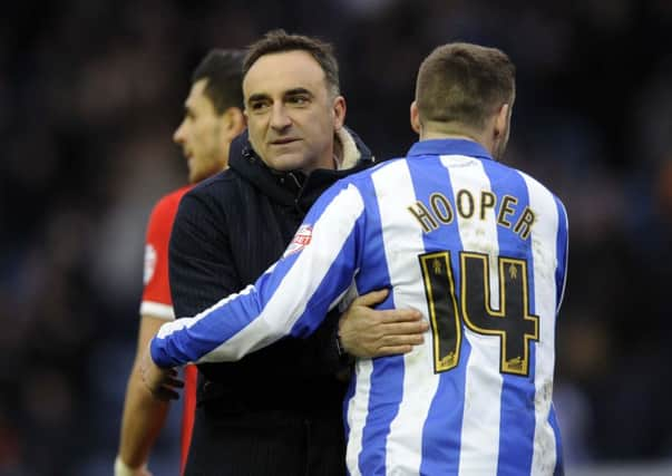 Happy Owls head coach Carlos Carvalhal