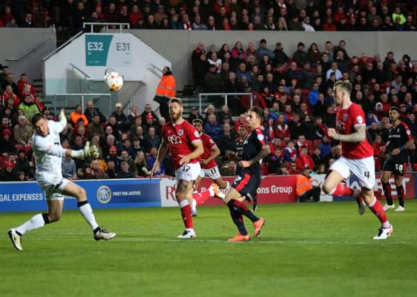 Matt Derbyshire scores. Pictures: Paul Wickson