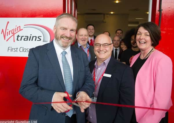 Cllr Bill Mordue, Cabinet member for business, skills, tourism and culture at Doncaster Council, with Virgin Trains General Manager Maxine Joicey and Simon Pashley, Station Manager. Copyright: Charlotte Graham - Guzelian