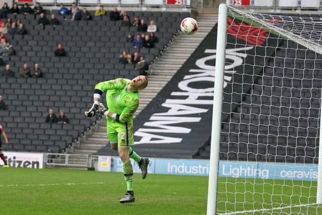 Richie Smallwood's 20-yard looped volley finds the net