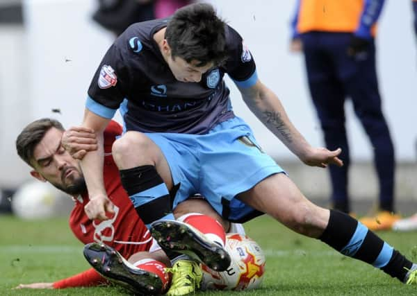 Bristol City's Marlon Pack stops Owls' Fernando Forestieri