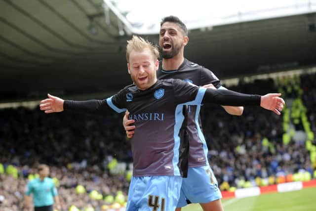 Barry Bannan celebrates with Marco Matias