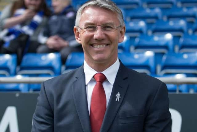 Nigel Adkins in typically cheery mood