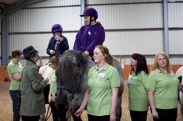 Pix: Shaun Flannery/shaunflanneryphotography.com

COPYRIGHT PICTURE>>SHAUN FLANNERY>01302-570814>>07778315553>>

11th May 2016
The Rossington Hall Group of the Riding for the Disabled Association today welcomed Her Royal Highness Princess Anne to open their new indoor riding arena. 

Antonia Swift