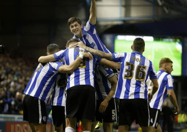 Fernando Forestieri leads the celebrations after Kieran Lee's goal