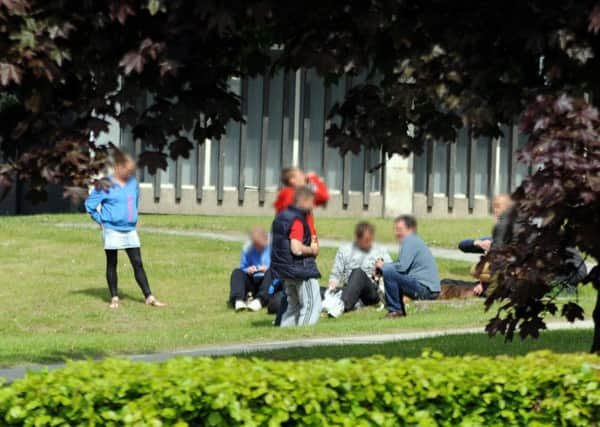 A group drinking outside the towns old magistrates court.