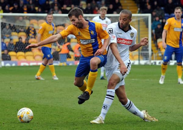 Matty Blair signed for Doncaster yesterday after rejecting a new deal with Mansfield.