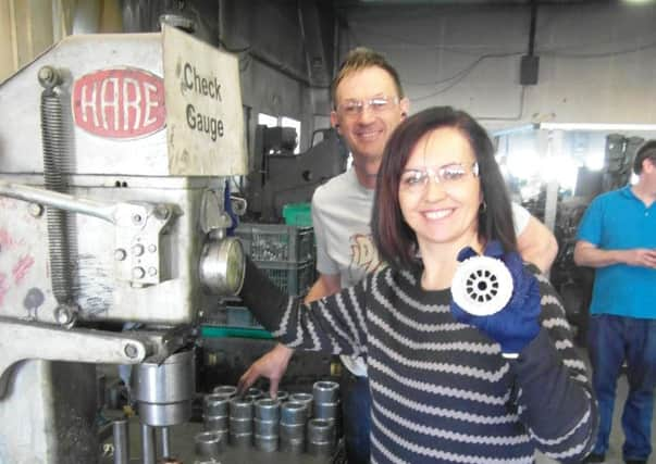 Caroline Flint and Gary Evans with a rotar at Hallam Castings