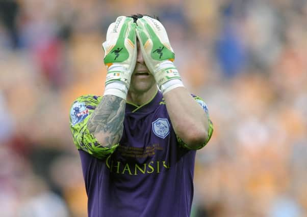 Despair for Owls keeper Keiren Westwood at the final whistle...Pic Steve Ellis