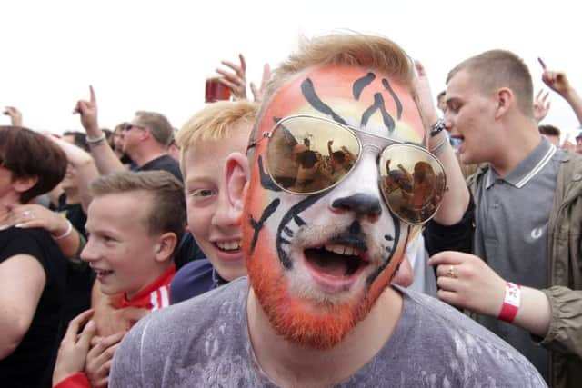 Fans enjoying the Mosborough Music Festival, Sheffield, United Kingdom on 4 June 2016. Photo by Glenn Ashley.