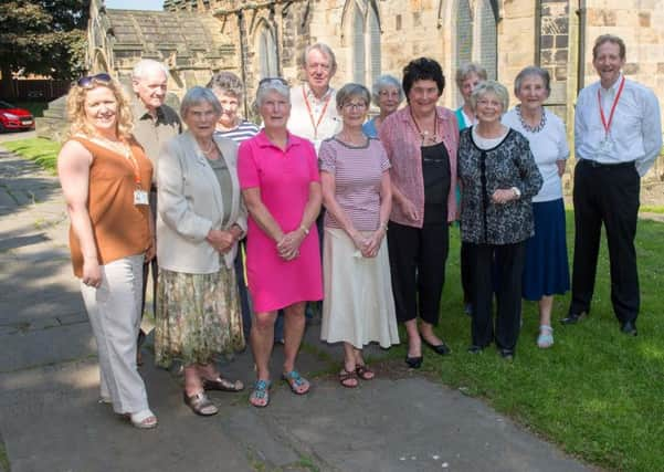 Rotherham hospice Chief executive Christopher Duff with volunteers at Wath Church