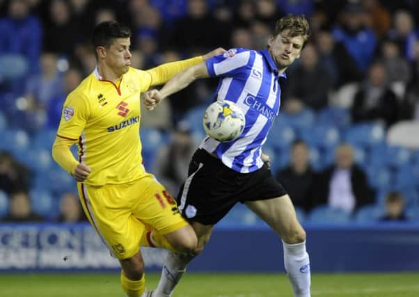 Owls skipper Glenn Loovens with Alex Revell