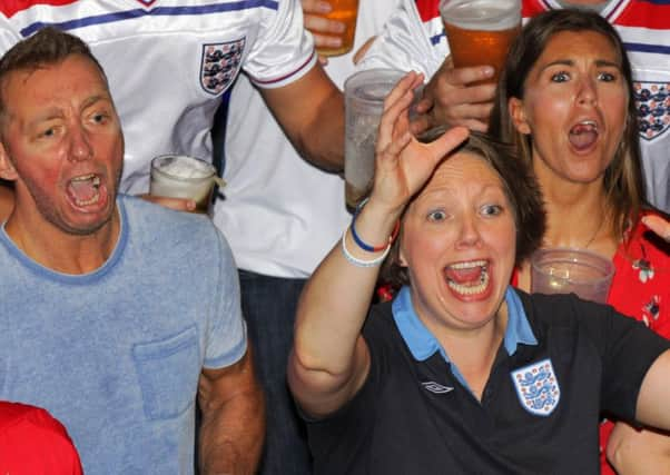 Fans watching England v Wales in Euro2016 at the Walkabout pub in Sheffield. Photo: Chris Etchells