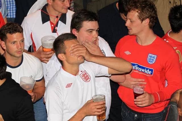 Fans watching England v Wales in Euro2016 at the Walkabout pub in Sheffield. Photo: Chris Etchells