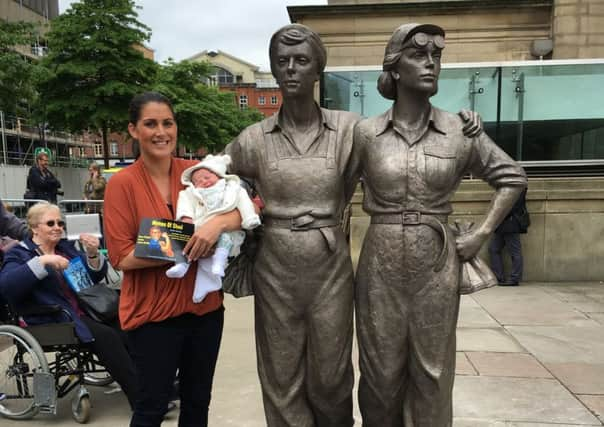 Five-day-old Florence Stirgess with her mum. Suzanne, after the Women of Steel ceremony. Florence's great-grandmother, Betty Wragg, was a woman of steel.