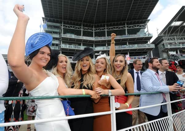 LADIES DAY AT YORK -- the Ebor Festival at York in August is one of a succession of excellent summer meetings across the UK.