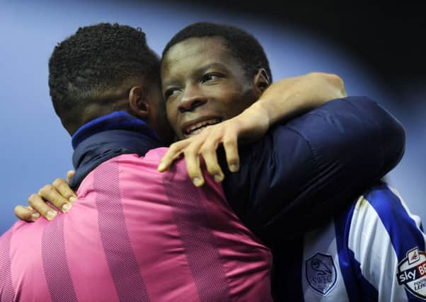 Jose Semedo is hugged by fellow Portuguese Owl Lucas Joao