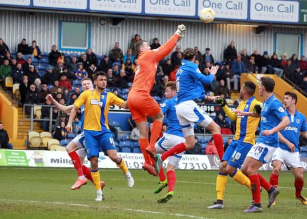 Mansfield Town v Portsmouth on Saturday March 19th 2016. Portsmouth keeper Ryan Fulton clears the ball. Photo: Chris Etchells