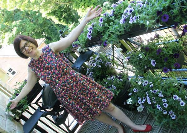 Nicola Mayer on her balcony in Broomhill