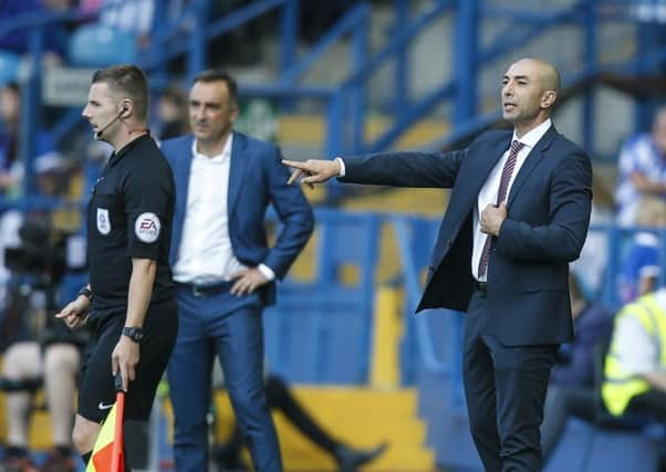 Aston Villa manager Roberto Di Matteo with Owls head coach Carlos Carvalhal