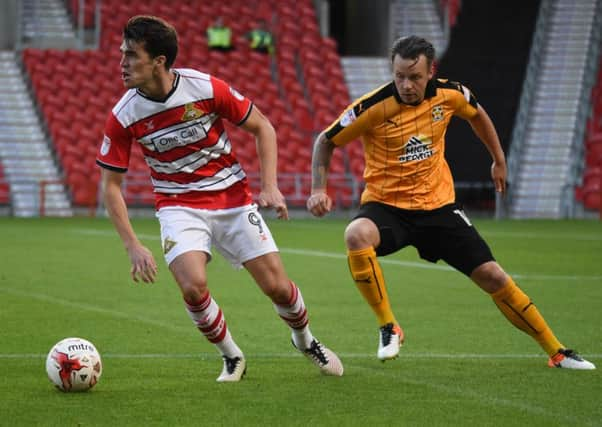 John Marquis looks to make something happen against Cambridge