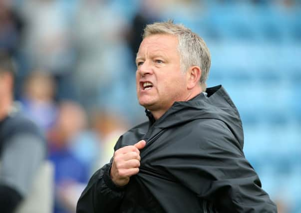 Chris Wilder celebrates at the final whistle