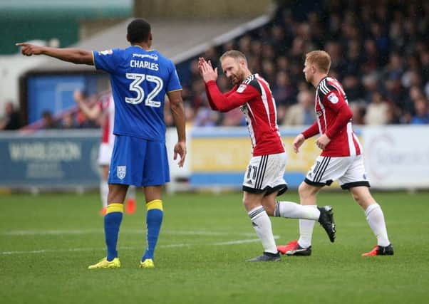 Sheffield United's Matt Done celebrates scoring at AFC Wimbledon