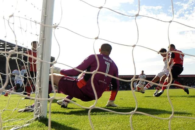 John Marquis puts Rovers 3-1 up.