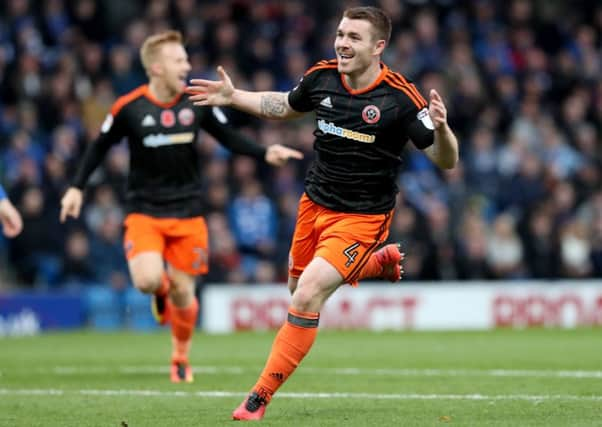 John Fleck of Sheffield United celebrating scoring during the English Football League One match at Proact Stadium, Chesterfield. Picture date: November 13th, 2016. Pic Jamie Tyerman/Sportimage