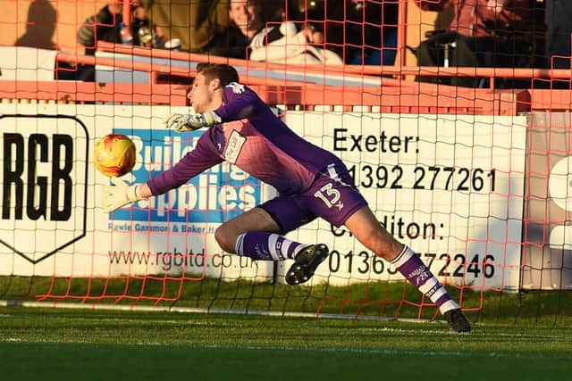 Marko Marosi cannot keep out Reuben Reid's penalty