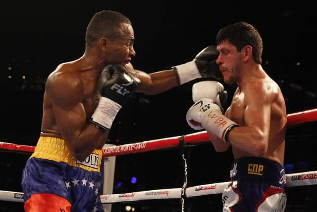 Liborio Solis lands a left hook on Jamie McDonnell