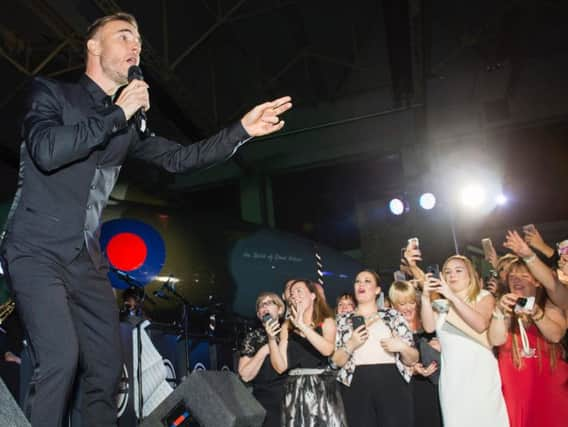 Gary Barlow performing at the Hidden Wounds charity concert inside the Vulcan Hangar. Photos: Dean Atkins.