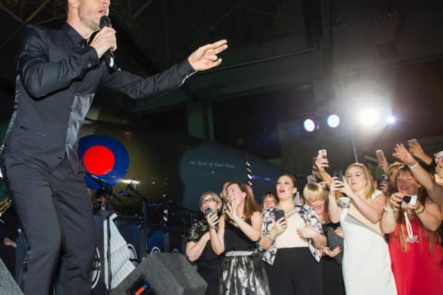 Gary Barlow performing at the Hidden Wounds charity concert inside the Vulcan Hangar. Photos: Dean Atkins.