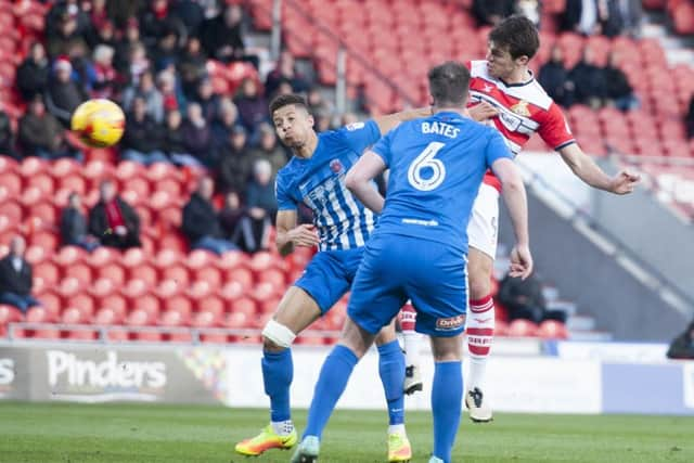 John Marquis heads the opener. Pictures: Dean Atkins