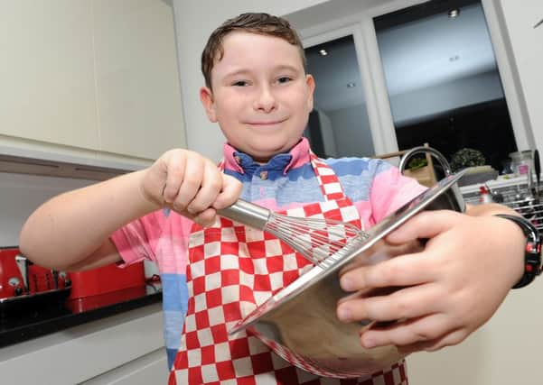 Jamie Wimble, 10, will appear on CBBC's junior bake off. Picture: Andrew Roe