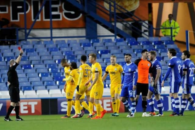 Eoin Doyle is sent off and was closely followed by Jermaine Beckford