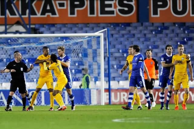 Eoin Doyle (right) and Jermaine Beckford have to be separated before both are then sent off