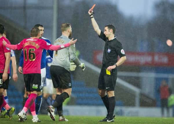 Chesterfield vs Peterborough United - David Coote sends off Ricardo Almeida-Santos off for a second booking putting peterborough down to 9 men - Pic By James Williamson