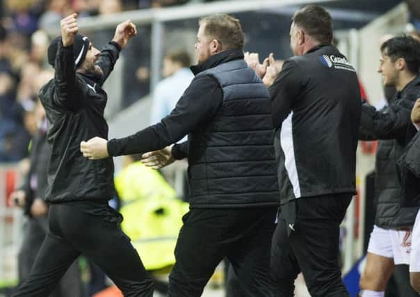 Paul Warne celebrates at the final whistle. Picture: Dean Atkins