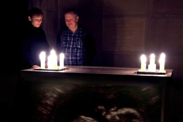 Advent at Sheffield Cathedral: Sister Karen Elizabeth and Meredith Evans by the 'Emmanuel' prayer installation in the crypt