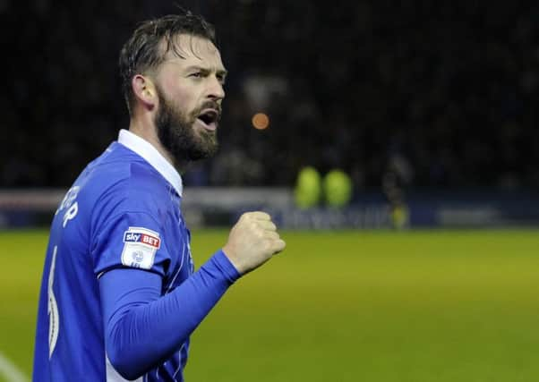 Steven Fletcher celebrates scoring a late winner for Wednesday over Rotherham