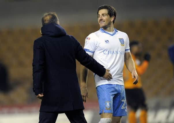 Sam Hutchinson with Carlos Carvalhal .Pic Steve Ellis