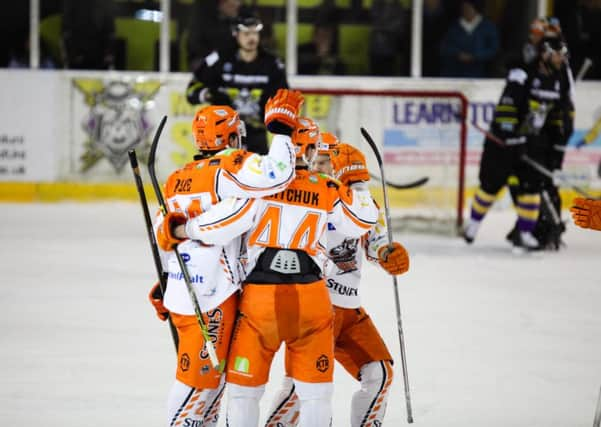 Mike Ratchuk celebrates scoring at Manchester