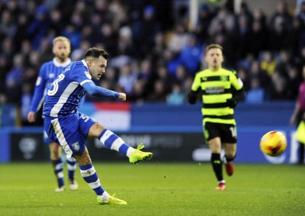 Wonder strike from Ross Wallace puts Sheffield Wednesday in front against Huddersfield. Pic Steve Ellis