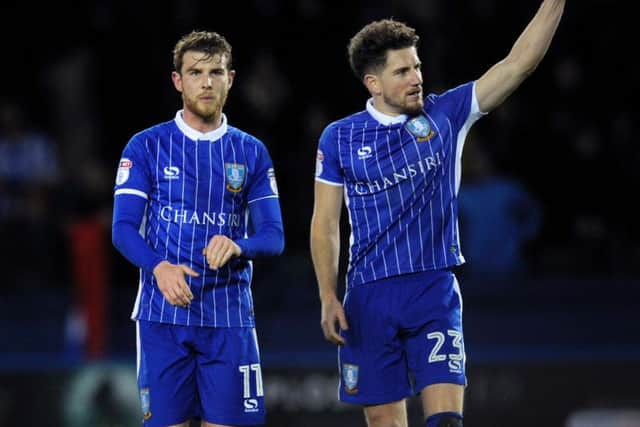 Sam Winnall and Sam Hutchinson at the final whistle