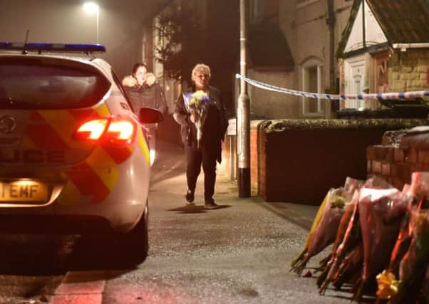 Well-wishers laid flowers close to where the girl's body was found in Dinnington, Rotherham