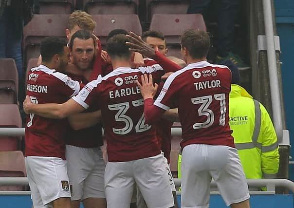 Picture by Gareth Williams/AHPIX.com. Football, Sky Bet League One; 
Northampton Town v Chesterfield; 11/02/2017 KO 3.00pm;  
Sixfields Stadium;
copyright picture;Howard Roe/AHPIX.com
John-Joe O'Toole is mobbed by his team mates after heading Northampton into the lead against Chesterfield